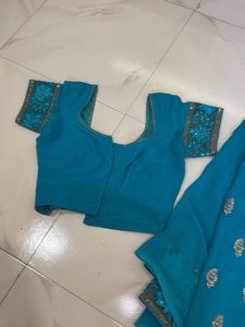 Beautiful Teal Saree with Embellishments