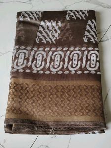 Brown Printed Saree with Gold Border