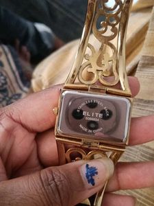 Elite women.s gold &amp; silver bangle watch