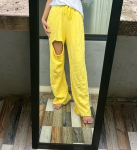 Bright Yellow Ripped Wide-Leg Pants
