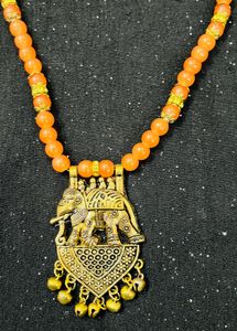 Orange Beaded Necklace with Elephant Pendant