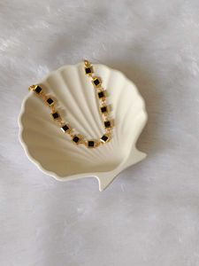 Elegant Bracelet with Black Stone Details