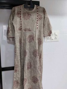 Elegant Beige Kurta with Starburst Print