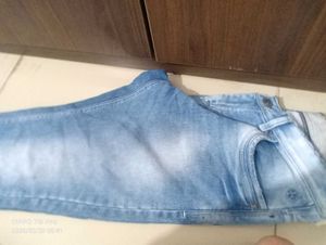 Stylish Light Wash Denim Jeans with Unique Patch D