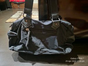 Stylish Black Hobo Bag with multiple pockets compa