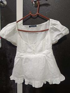 Chic White Peplum Top with Puff Sleeves