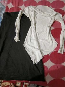 asymmetrical top and black skirt outfit