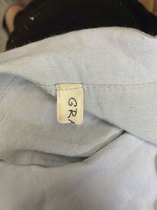 Light Blue Peplum Top