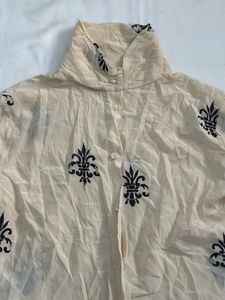 cream shirt