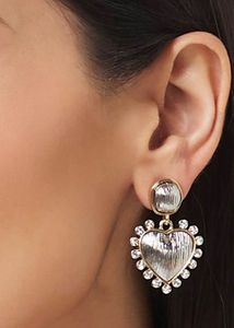 Gold toned and artificial stone drop earring