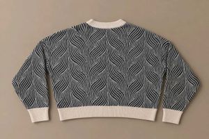 BLACK &amp; CREAM ABSTRACT WAVE KNIT SWEATER