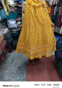 Stunning Yellow Sequined Lehenga Choli