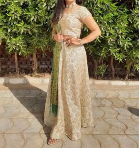 Cream Colour Lehenga Choli With Green Dupatta