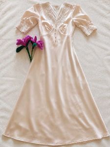 Elegant Peach Lace Trimmed Gown
