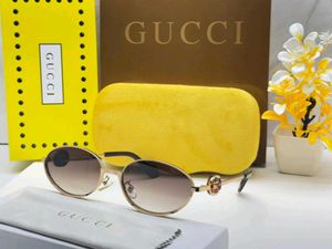 Gucci Oval Sunglasses