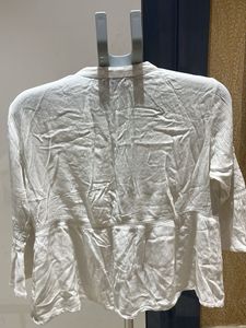 White Embroidered Peplum Top