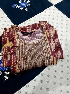 Elegant Maroon Printed Kurta with Tassel Detail