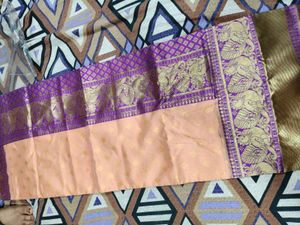 Elegant Peach Saree with Peacock Border