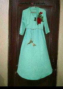 Beautiful Mint Green Gown with Floral Embroidery