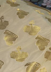 Elegant Yellow Saree with Intricate Motifs
