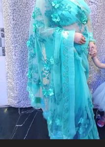Stunning Teal Floral  Net Embroidered Saree