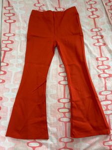 Vibrant Orange Flare Pants