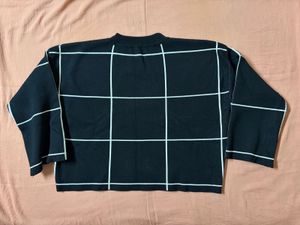 Black and white grid sweater