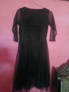 Elegant Black Dress with Sheer Sleeves