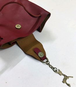 Sling bag Red Puf leather Arjustable/unique fan