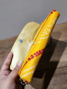 Yellow Bandhani Clutch with Beaded Handle
