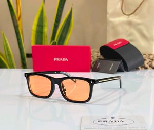 Prada Tortoiseshell Sunglasses with Pink Lenses