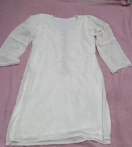 mustard colour plazo and off white top