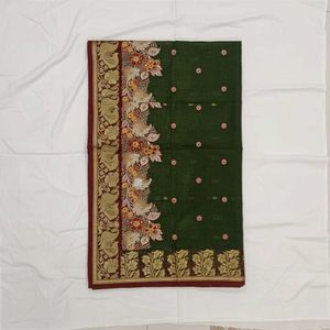 Elegant Green Saree with Intricate Borders