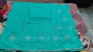 Elegant Turquoise Embroidered Saree