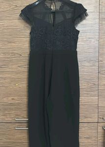 Chic Black Jumpsuit with Sheer Detail