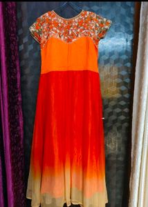 Elegant Orange Embroidered partywear Gown