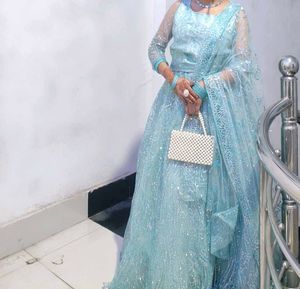 Stunning Blue Sequined Lehenga Choli