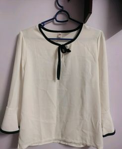 Elegant White Blouse with Black Trim