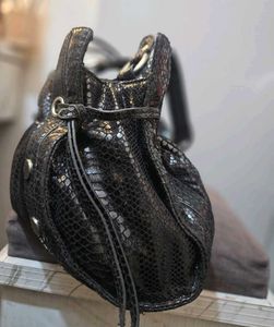 Nine West y2k python slouchy studded bag