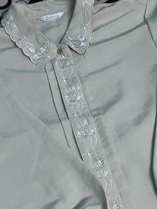 cream colored embroidery detail shirt