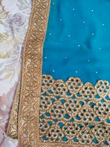 Teal Saree with Gold Border