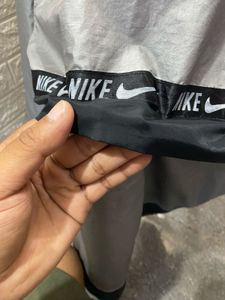nike lightweight silver jacket