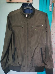 A Winter Jacket With Dual Colours. You can Use It Both Ways - Tortoise Olive And Ocean Blue.