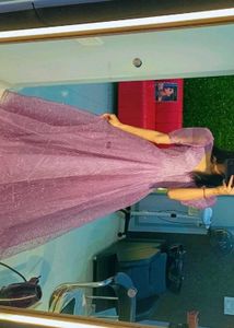 The back features a high neckline with