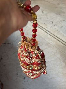Brand new Maroon & Embellished Potli Bag