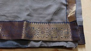 Elegant Grey Saree with Gold Border