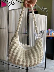 Crocheted Black Handbag with Flower Charm
