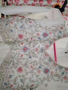 Farashi sharara and peplum top fully embroidered.