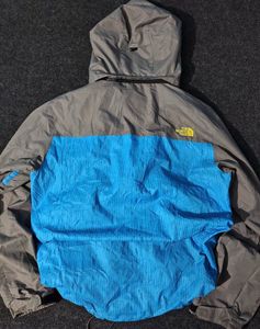 THE NORTH FACE BLUE AND GREY JACKET