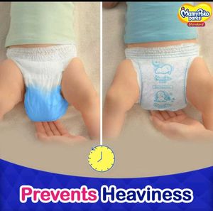 2 Packs Of 38 Mamypoko's Pants With 3 Diapers Free